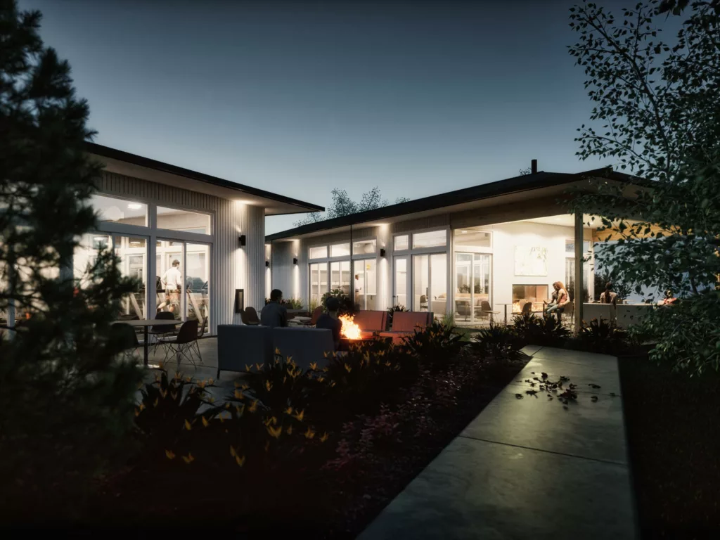 A rendering of a the new Magnesium Village apartment club patio at night, showcasing out door fireplace and modern architecture.