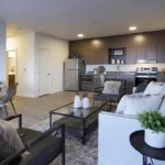 Kitchen from the living room of the 3 bed 2 bath floor plan